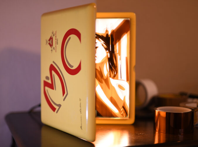 Exquisite tape art 'Nocturne' by Max Zorn, ensconced in a vintage cigar box repurposed into an elegant LED lightbox, showcasing a contemplative female figure