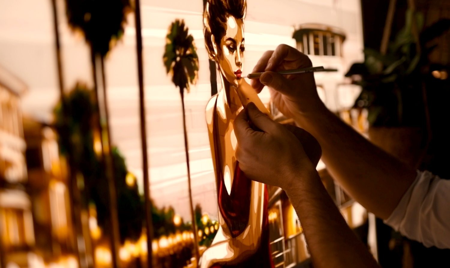 Max Zorn uses a precision knife near a woman’s lips in Crossroads, a backlit tape artwork with palm trees.